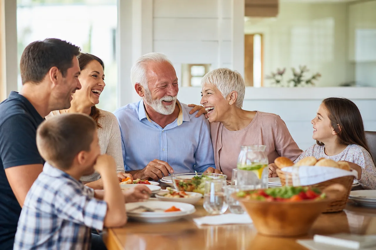 Happy family laughing together over a meal at home